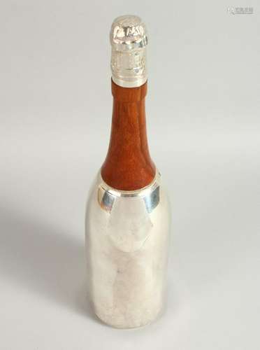 A NOVELTY CHAMPAGNE BOTTLE COCKTAIL SHAKER.  36cms