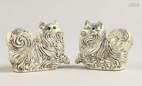 A PAIR OF .800 SILVER CAT SALT AND PEPPERS.