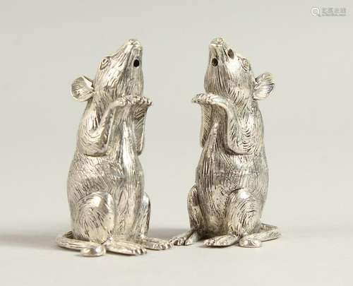 A PAIR OF .800 SILVER MICE SALT AND PEPPERS.