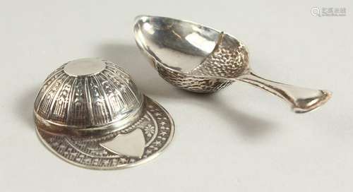 A NOVELTY SILVER JOCKEY CAP CADDY SPOON and A SPOON