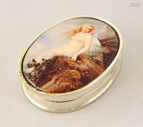 A SILVER AND ENAMEL OVAL PILL BOX, with a classic nude.