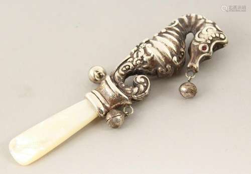 A SILVER AND MOTHER-OF-PEARL SEAHORSE BABIES RATTLE.