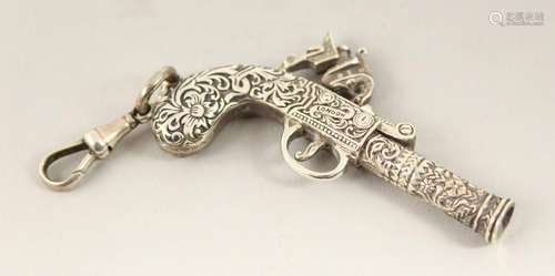 A SILVER PISTOL WHISTLE.