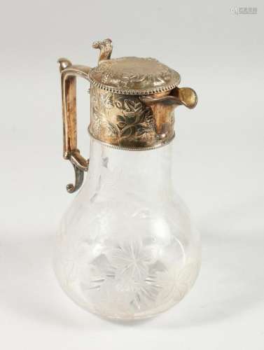 A HEAVY VICTORIAN GLASS AND SILVER CLARET JUG, engraved