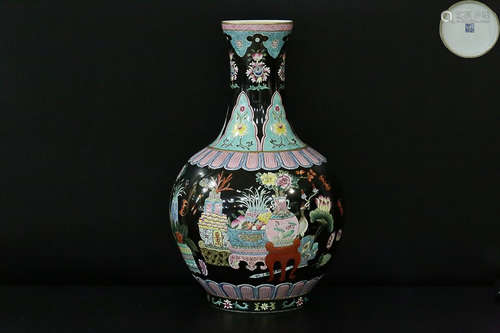 QIANLONG MARK BLACK GLAZE FAMILLE ROSE 'BOGU' VASE