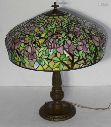 HANDEL. Gilt Metal Table Lamp And Leaded Shade.