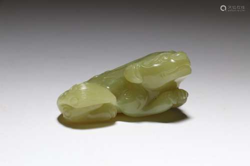 A Chinese Carved Jade Foo-Dog