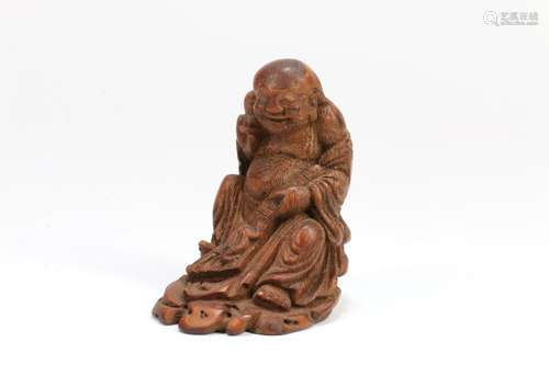 A Chinese Carved Bamboo Buddha