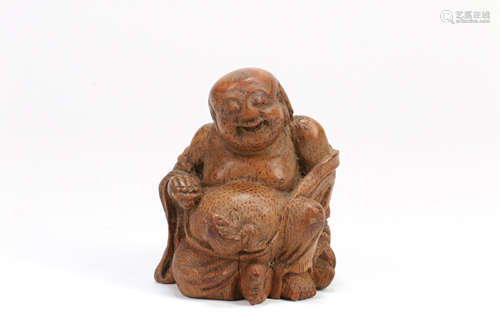 A Chinese Carved Bamboo Buddha