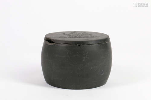 A Chinese Carved Yixing Clay Can with Cover