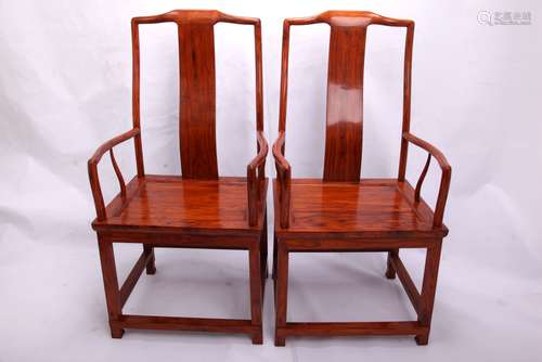 A Pair of Chinese Carved Huanghuali Chairs