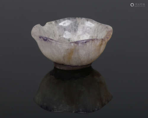 A Chinese miniature carved hardstone bowl with petal formed rim. With white and purple suffusion,