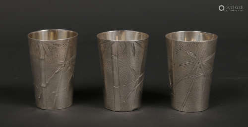 Three Chinese sterling silver beakers of tapering cylindrical form. With planished grounds and
