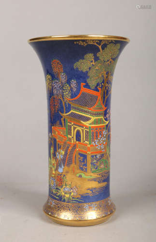 A Carlton Ware cylindrical vase of tapering form. Powder blue ground, enamelled and gilded with a