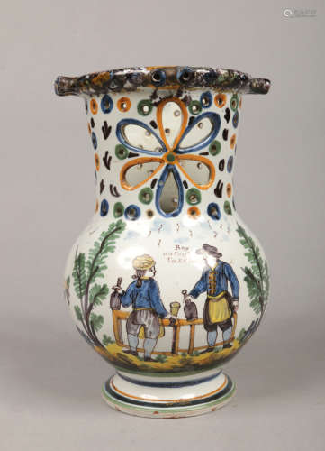A 19th century Continental faience puzzle jug. Painted with figures and animals in a landscape,