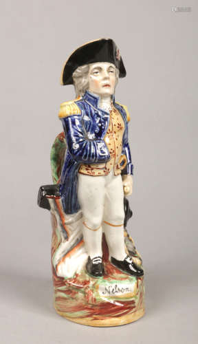 A Victorian Staffordshire pottery character jug formed as Admiral Lord Nelson and raised on a
