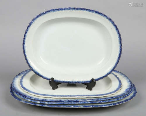 Four late 18th century Ferrybridge serving plates with feather moulded lobed rims edged in