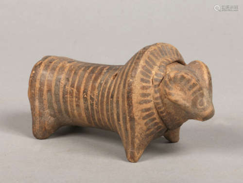 An Indus Valley terracotta model of a ram with painted detail, 13cm.