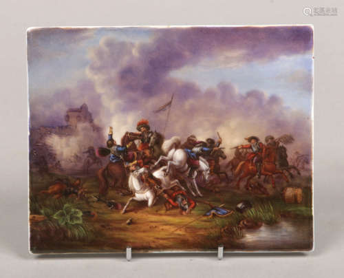 A 19th century rectangular porcelain plaque. Finely painted with a battle scene depicting mounted