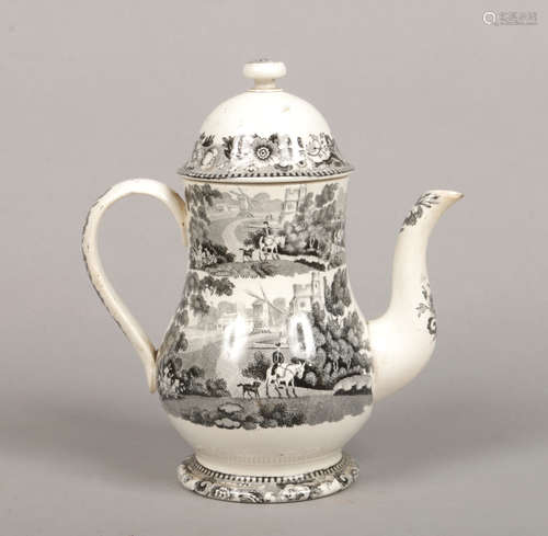 An 18th century pearlware coffee pot and cover. Bat printed with landscapes incorporating a horseman