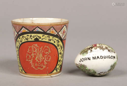 A prattware pottery egg, printed and enamelled with figures in landscapes and inscribed John