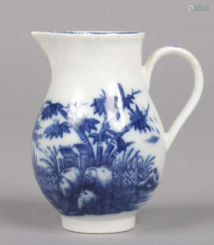 A Caughley sparrow beak cream jug with loop handle. Printed in underglaze blue with the Fence and