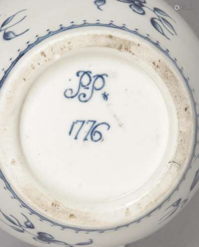 A rare inscribed and dated Worcester teapot painted in underglaze blue with the Narcissus pattern.