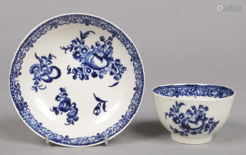 A Liverpool Seth Pennington teabowl and saucer. Printed in underglaze blue with fruit and flower