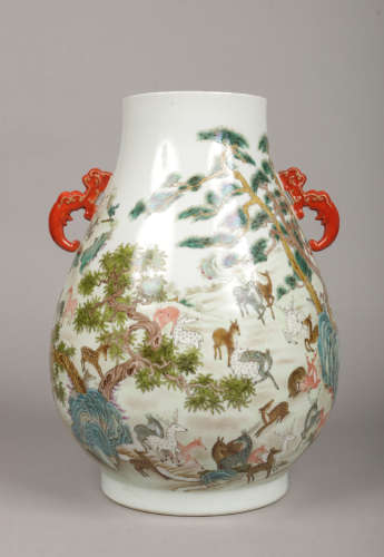 A large Chinese famille rose 'Deer' vase of archaistic broad pear form. With stylized dragon handles