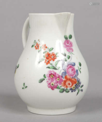A Worcester large sparrow beak jug with loop handle. Painted in coloured enamels with a bouquet of