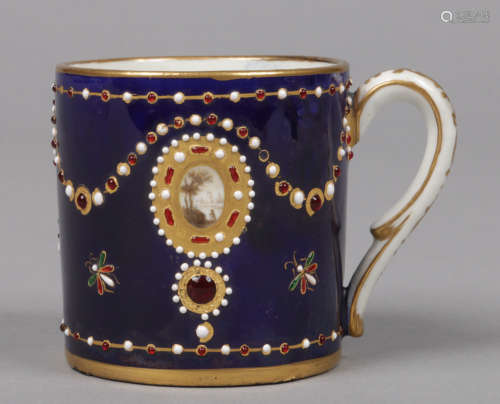 A 19th century Sevres style coffee can (gobolet 'litron') ground in gros bleu with gilt and