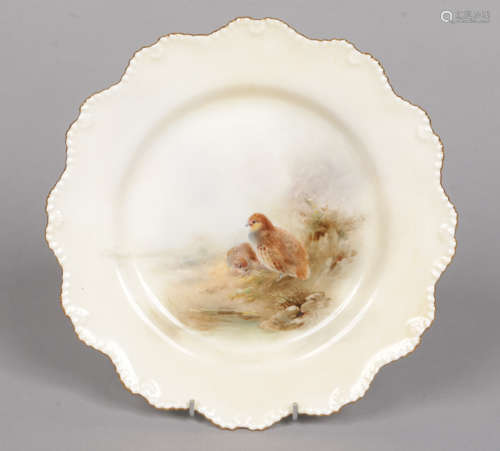 A Royal Worcester plate by James Stinton with scalloped and gadrooned border. Painted with a