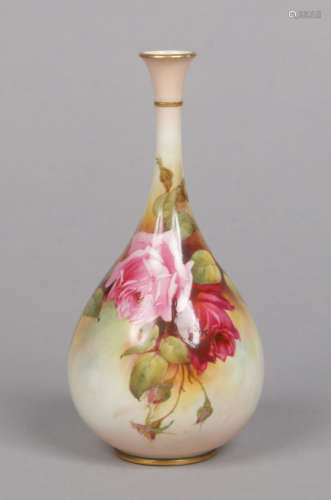A Royal Worcester bottle vase by Frederick Bray. Painted with Hadley type roses and with two gilt