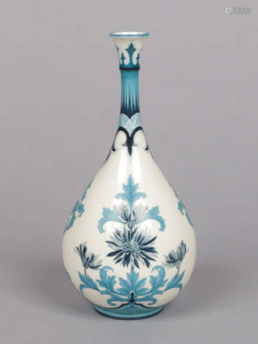 A fine Hadley's Worcester faience tear drop shaped vase. Painted in shades of blue in the Persian