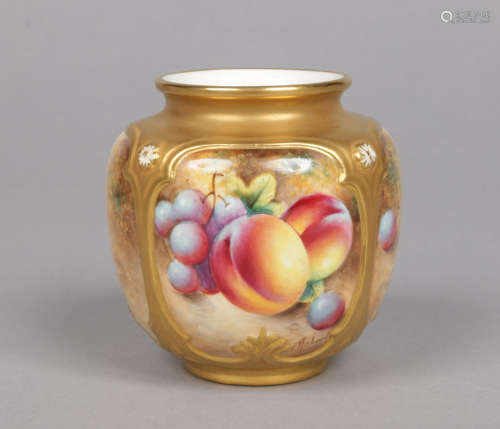 A Royal Worcester squat bud vase by Frank Roberts. Moulded with gilt panels and painted with peaches