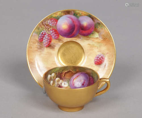 A Royal Worcester coffee cup and saucer. by Harry Ayrton and George Cole. Painted with peaches,