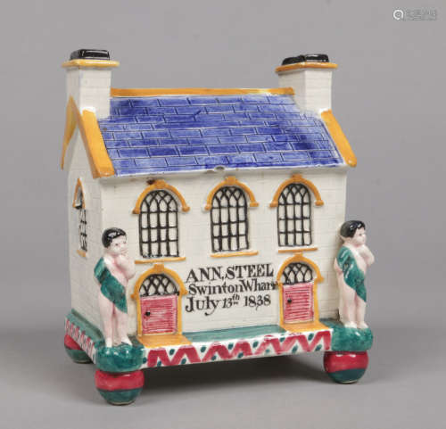 A Mexborough Wesleyan chapel prattware money box. Decorated in coloured glazes and inscribed Ann
