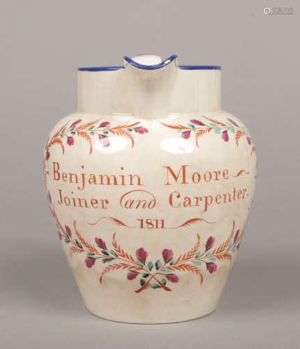 A documentary Don pottery jug. Inscribed Benjamin Moore, Joiner and Carpenter, 1811, within a flower