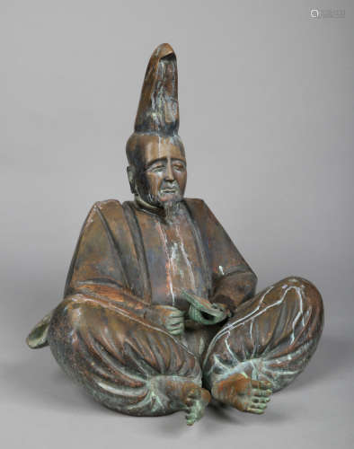 A Japanese bronze sculpture of a seated Shogun dictator, 58cm high.Condition report intended as a