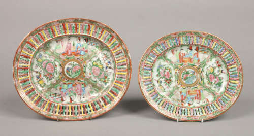 Two 19th century Cantonese graduated ovoid stands with reticulated borders. Each painted in coloured