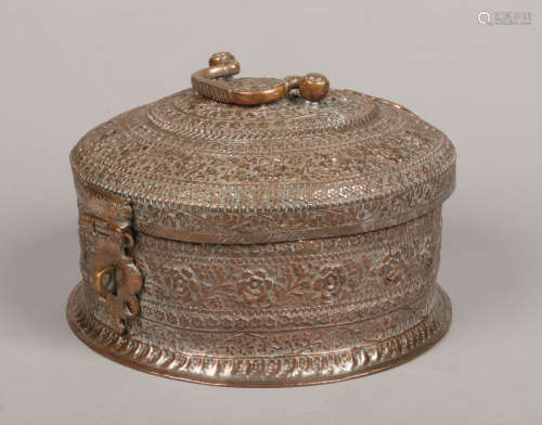 A 19th century Indian copper casket fitted with matching vessels, circular serving tray and having