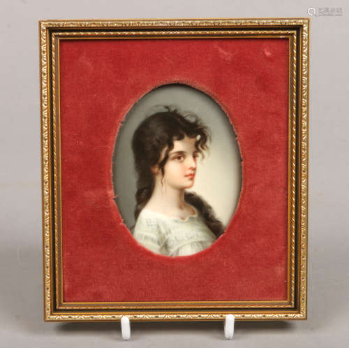 A 19th century KPM style portrait miniature. Depicting a young girl in a night dress. Condition