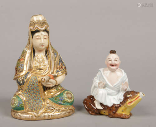 A 20th century Japanese Satsuma figural lamp base formed as Guanyin seated holding a scroll along