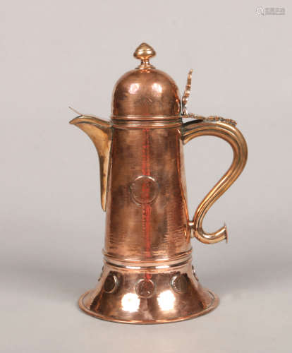 A George III Scottish armorial planished copper ale jug. With domed cover, open fret thumb-piece,