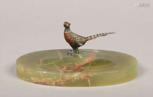 An Austrian cold painted bronze model of a cock pheasant raised on an oval onyx desk tray, 19cm