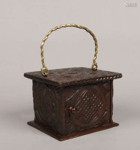 A 19th century Dutch carved oak carriage warmer with brass swing handle, 21cm wide. Condition report