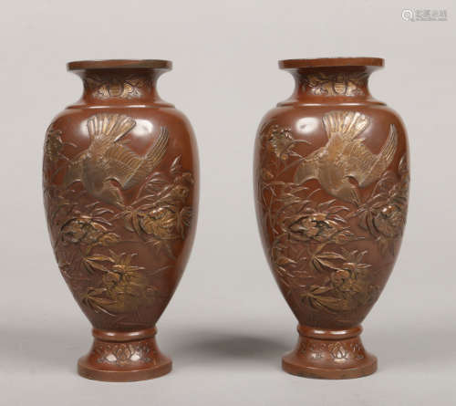 A pair of Japanese Meiji period bronze overlay baluster vases. Each decorated with three partridges,