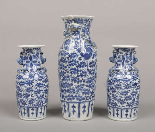 A garniture of three 19th century Chinese blue and white vases. Painted in underglaze blue with
