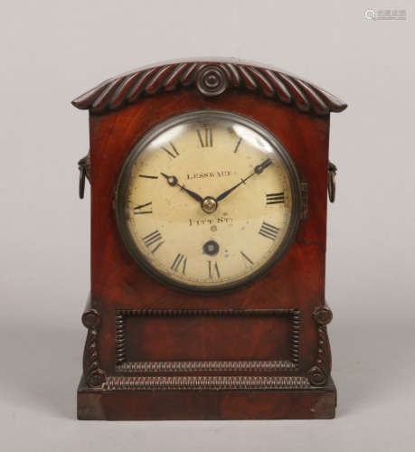 An Irish Regency mahogany cased 8 day fusee bracket clock by Joseph Lessware, Dublin. With carved