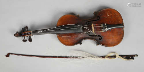 A cased German violin and bow. Label for Stradivarius, 35.75cm.